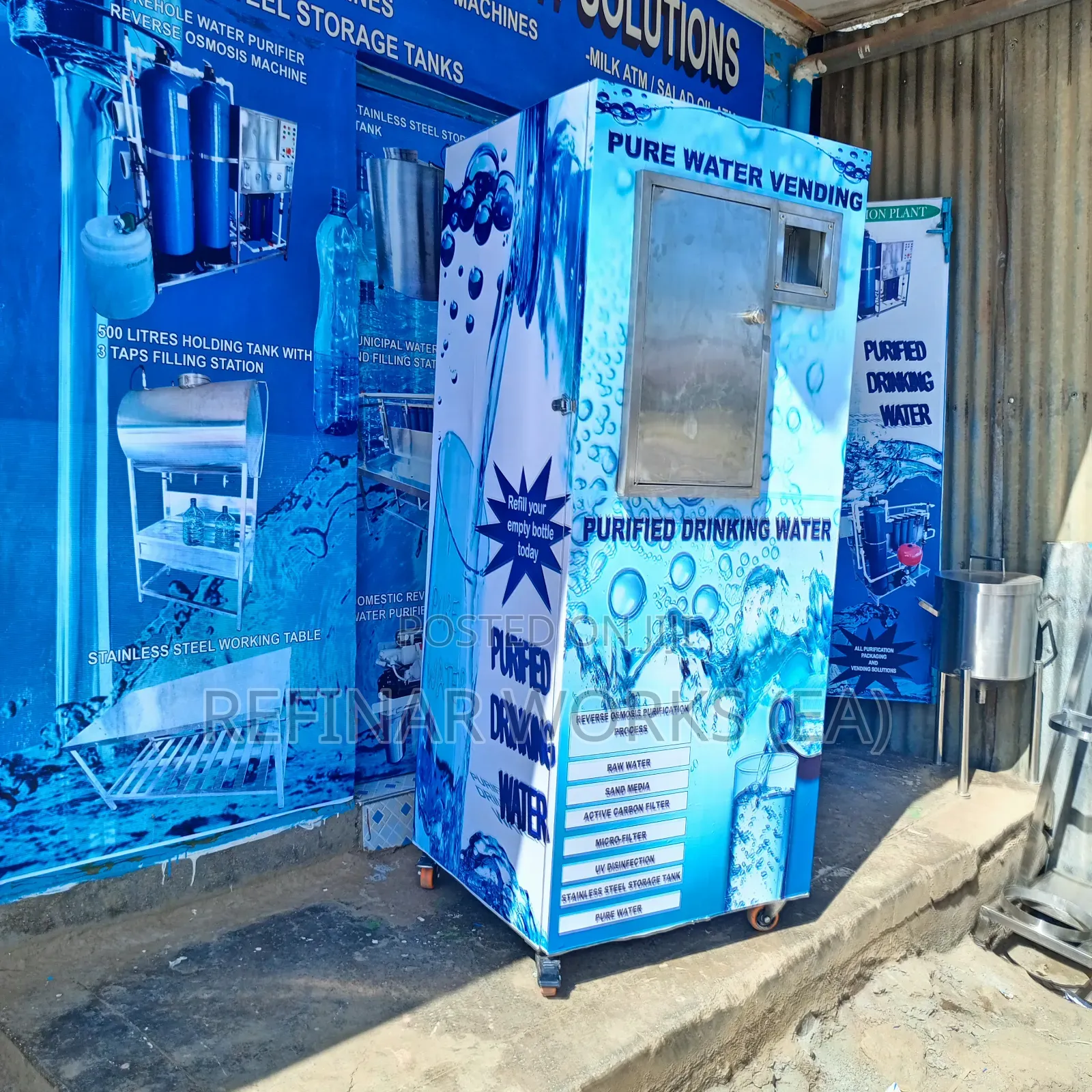 Water Vending Cabinet. Simple Wall Mounted. Accepts Coins.