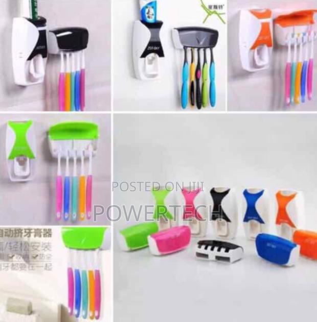 *Toothbrush Holder/ Toothpaste Dispenser.