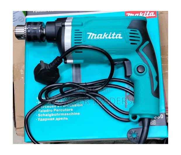 Makita Ph1630
Hammer Drill 
710w
 at 3500 - main view