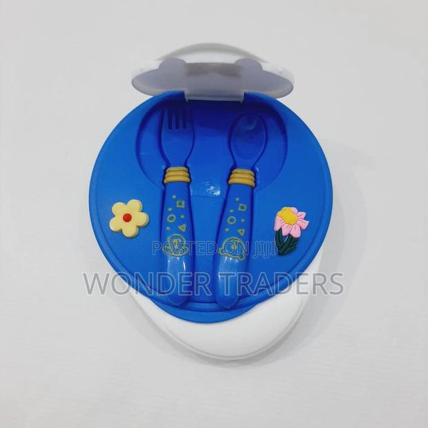 *Bowl With Spoon and Fork* - main view