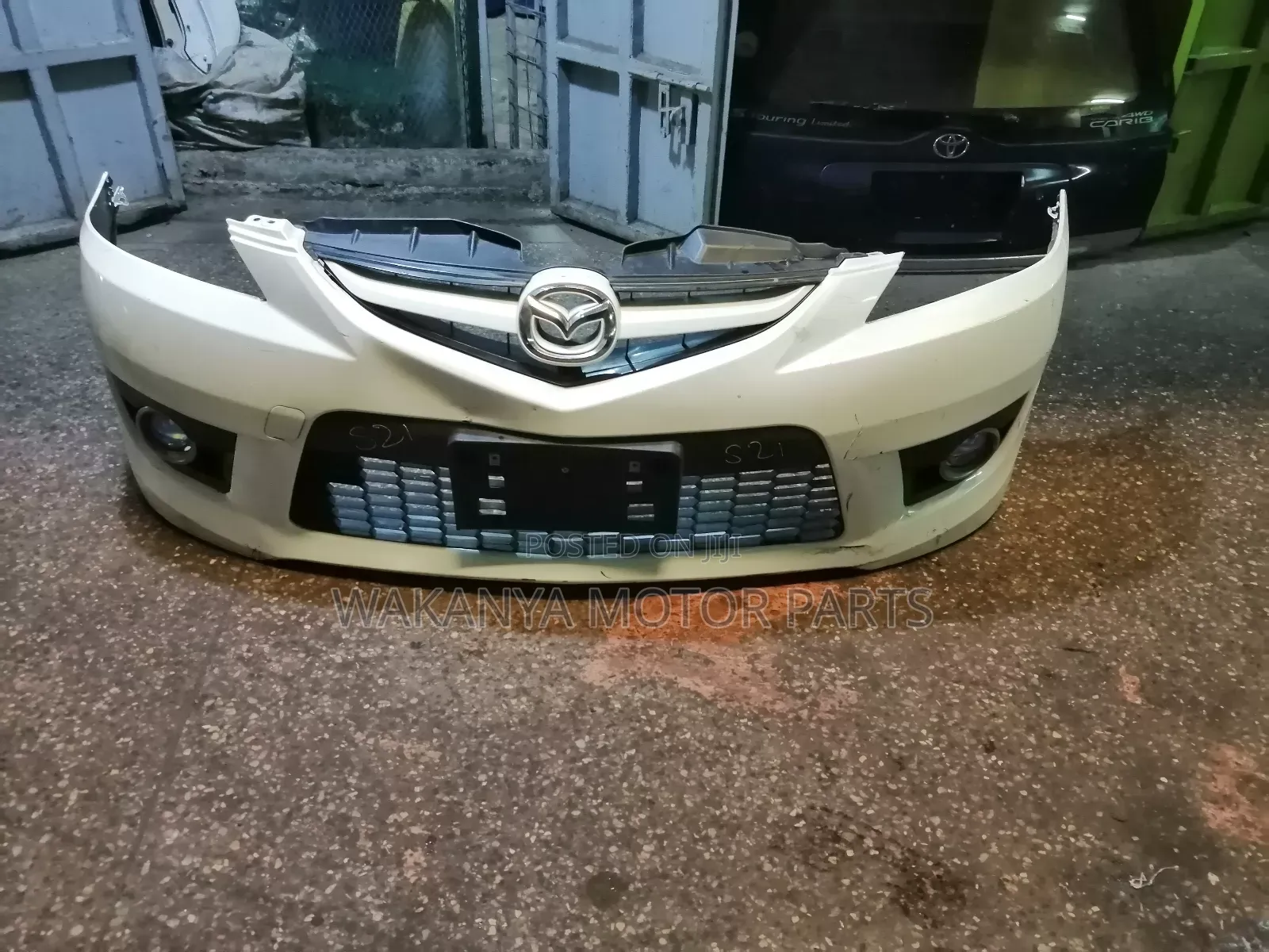 Mazda Premacy 2008/2009 Front Bumper Complete With Fog Lamps