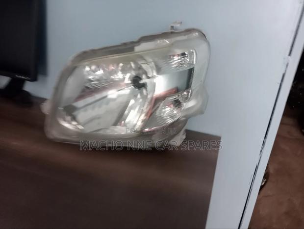 Daihatsu Tanto 2012 Headlight