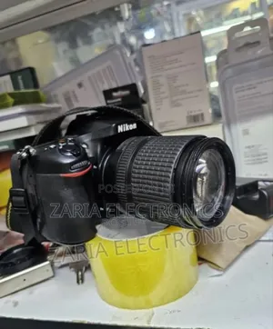 Nikon D7100 Camera With 18-140mm Lens And Silicone Cover
