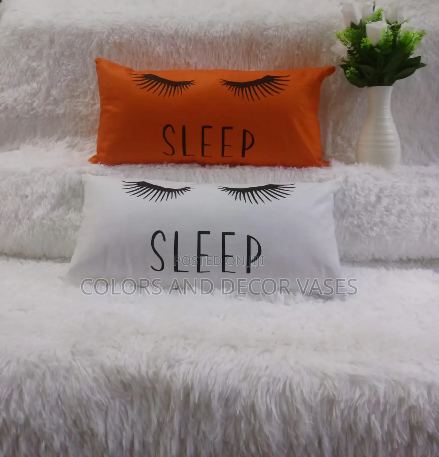 Sleep Orange and White Pillows