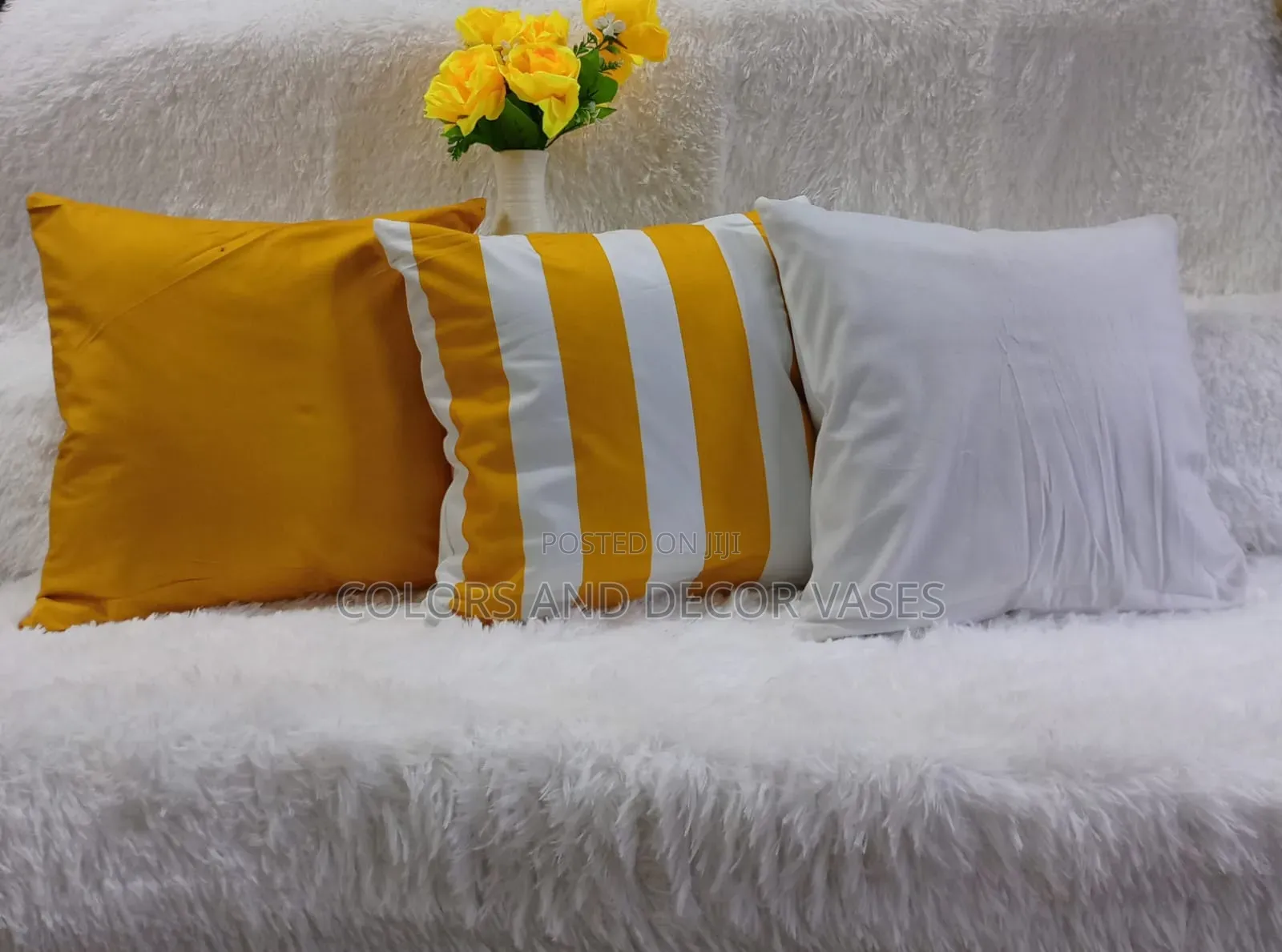 Yellow and White Throw Pillows