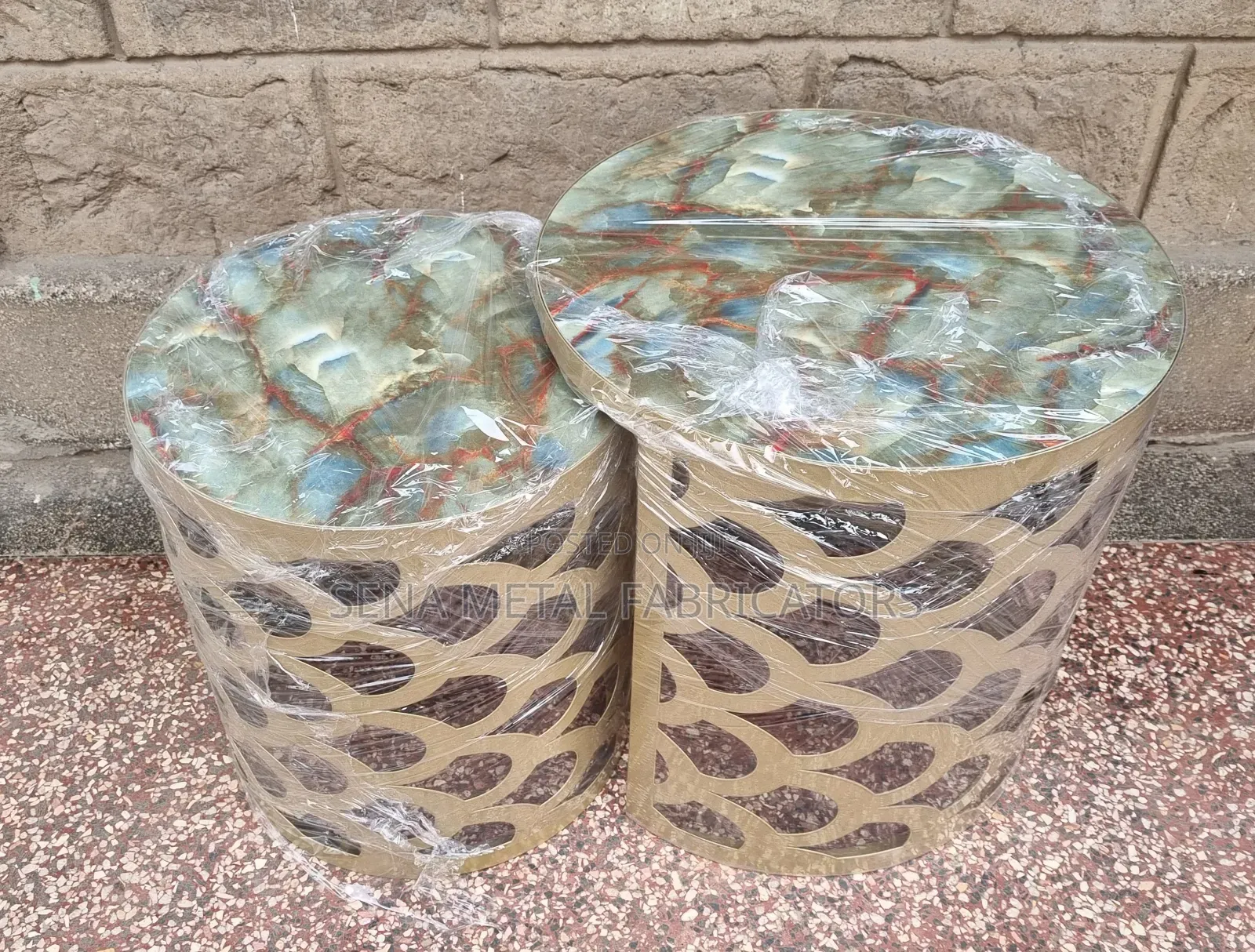 Nesting Stools With Laser-Cut Designs in Gold Colour.