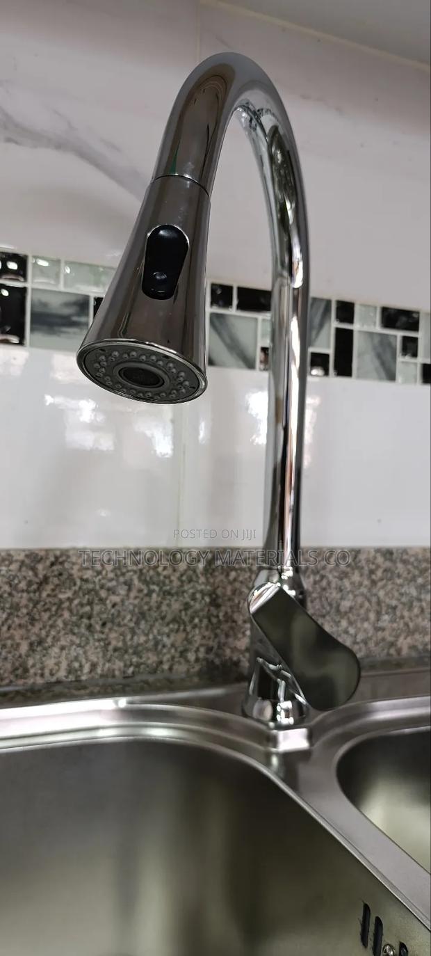 Stainless Steel Pull-Down Kitchen Faucet.