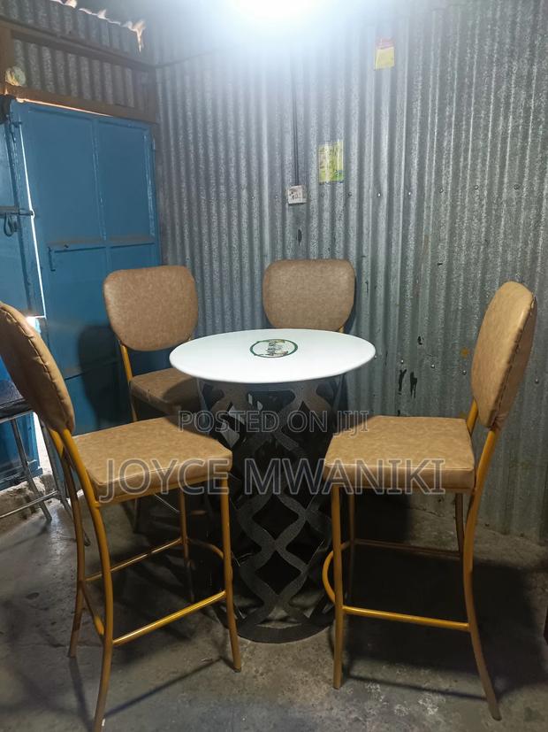 High Bar Set of 4 Chairs and a Drum Table 