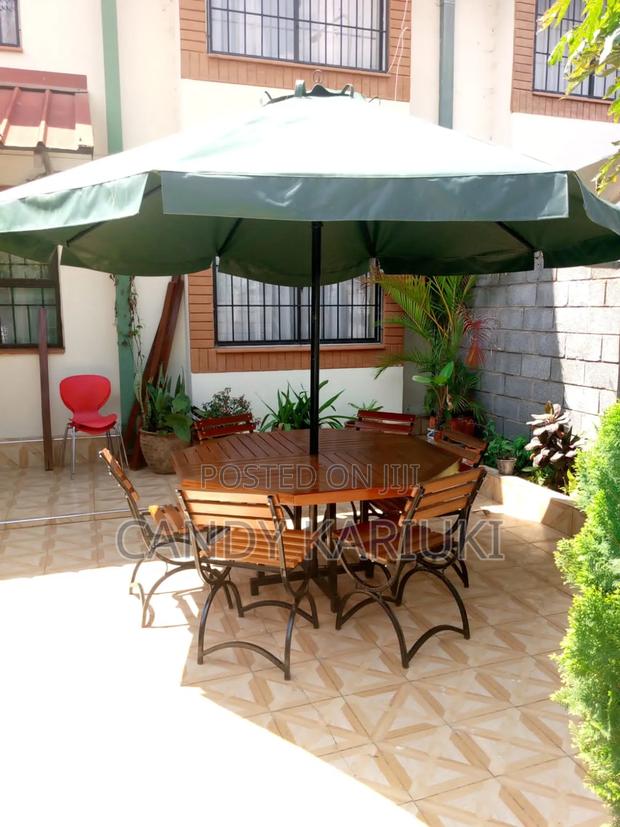 Patio Set ( 6 Chairs, Table Plus Umbrella)