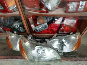 Ex-Japan Platz 2000 Model Headlights Complete With Bulbs