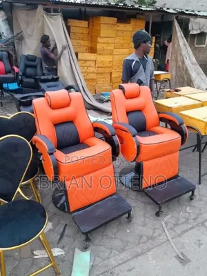 Rotating Orange Kinyozi Seats