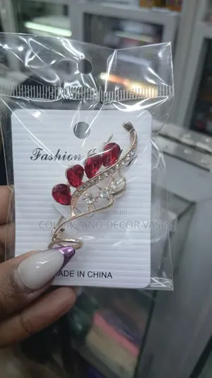 Brooches in Red Variety Available