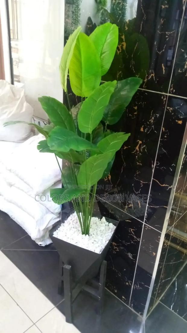 Black Vase and Stand With Artificial Banana Plant