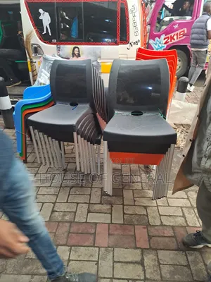 Armless Plastic Chair With Metal Tubing Legs