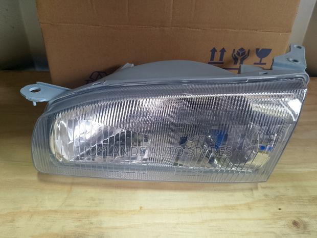 AE 110 Headlamp/Headlights Plastic