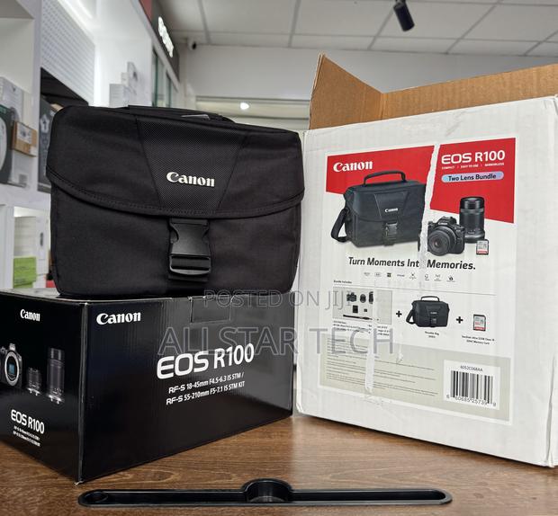 Canon EOS R100 Mirrorless Camera With 18-45mm And 55-210mm