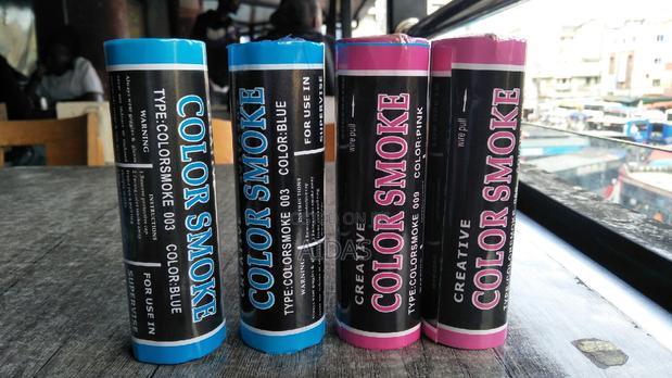 A Boy or a Girl Gender Reveal Color Smokes