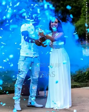 A Boy or a Girl Gender Reveal Color Smokes