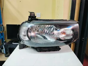 Headlight Nissan Cube Ex Japan