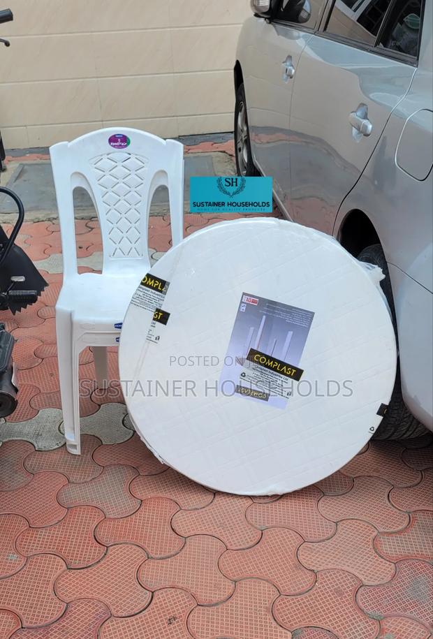 Round Plastic Table With 2 Armless Kenpoly Plastic Chairs - main view