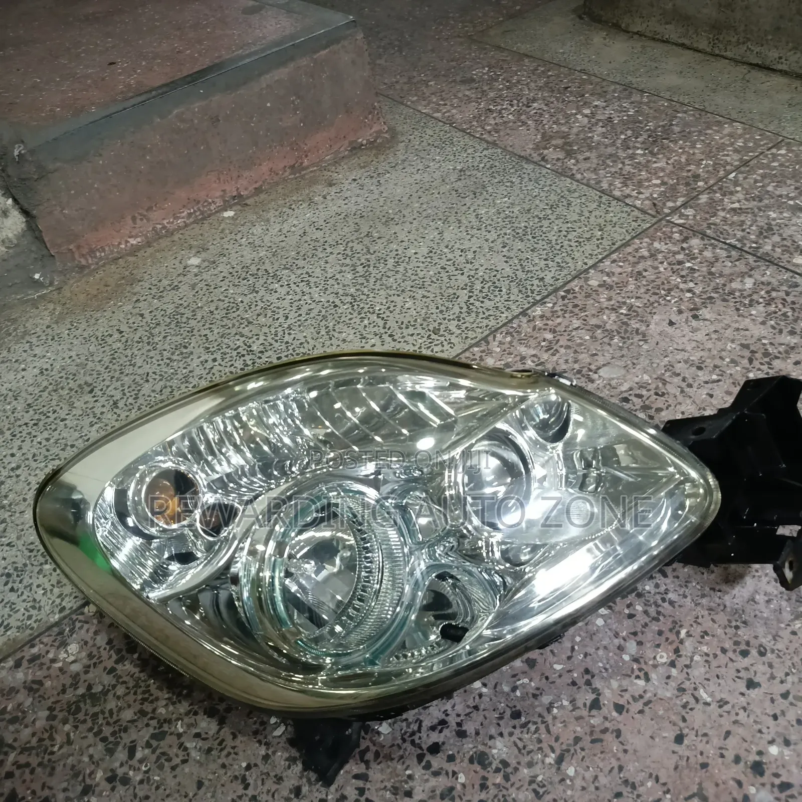 Mazda Verisa Zenon Headlight.