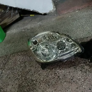 Mazda Verisa Zenon Headlight.