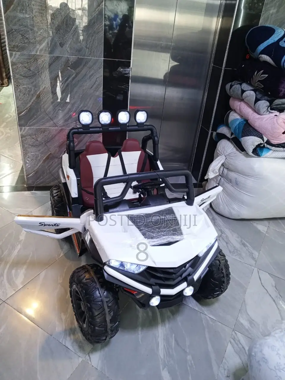 Stylish Kids' Electric Car - Battery Powered for Outdoor Fun