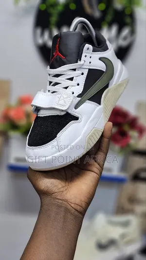 "Nike Travis X Jordan Jumpman
1st Leather Sneakers
