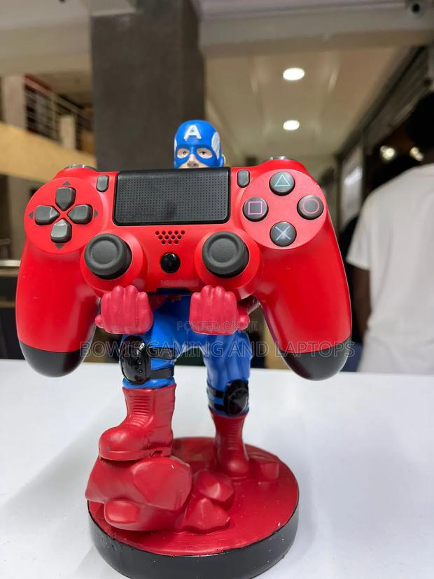 Game Controller Holding Statue Captain America