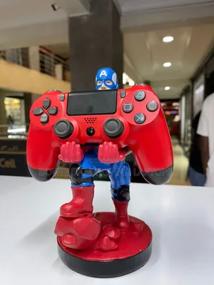 Game Controller Holding Statue Captain America