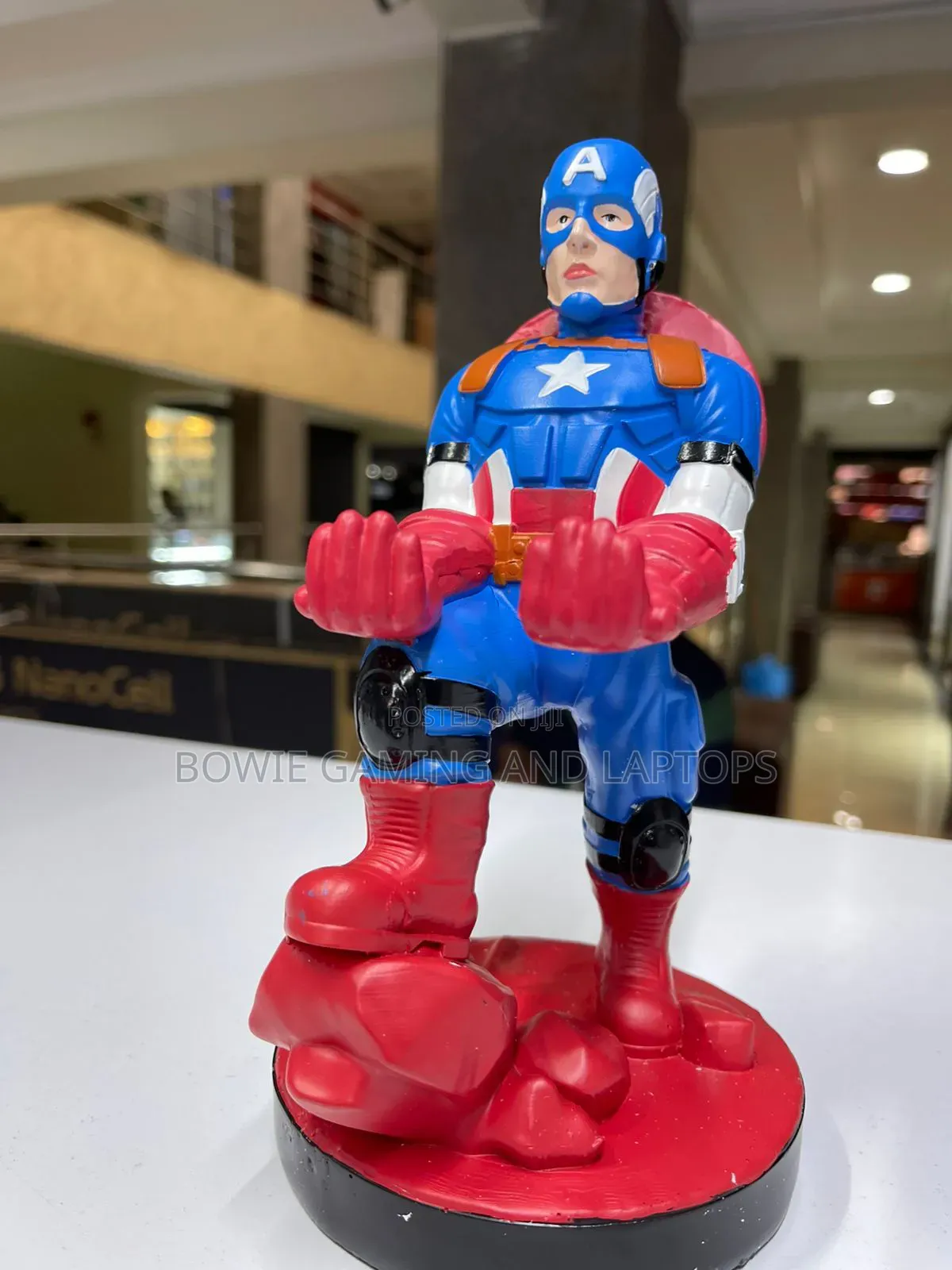 Game Controller Holding Statue Captain America