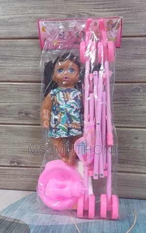 *Stroller And African Doll* - thumbnail 2