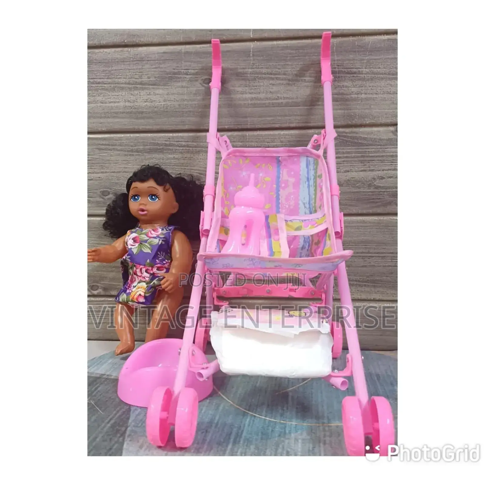 Stroller and African Doll