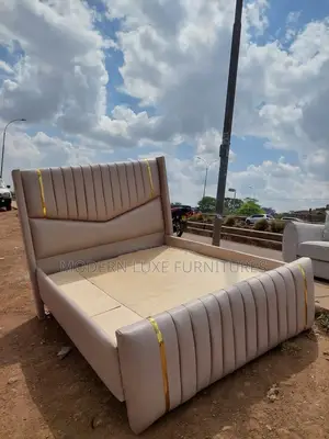 Cream Upholstery Tufted King Bed With Wingback Headboard