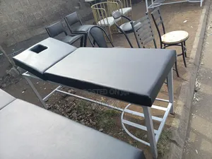 Metallic Examination Bed.