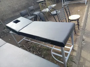 Metallic Examination Bed.