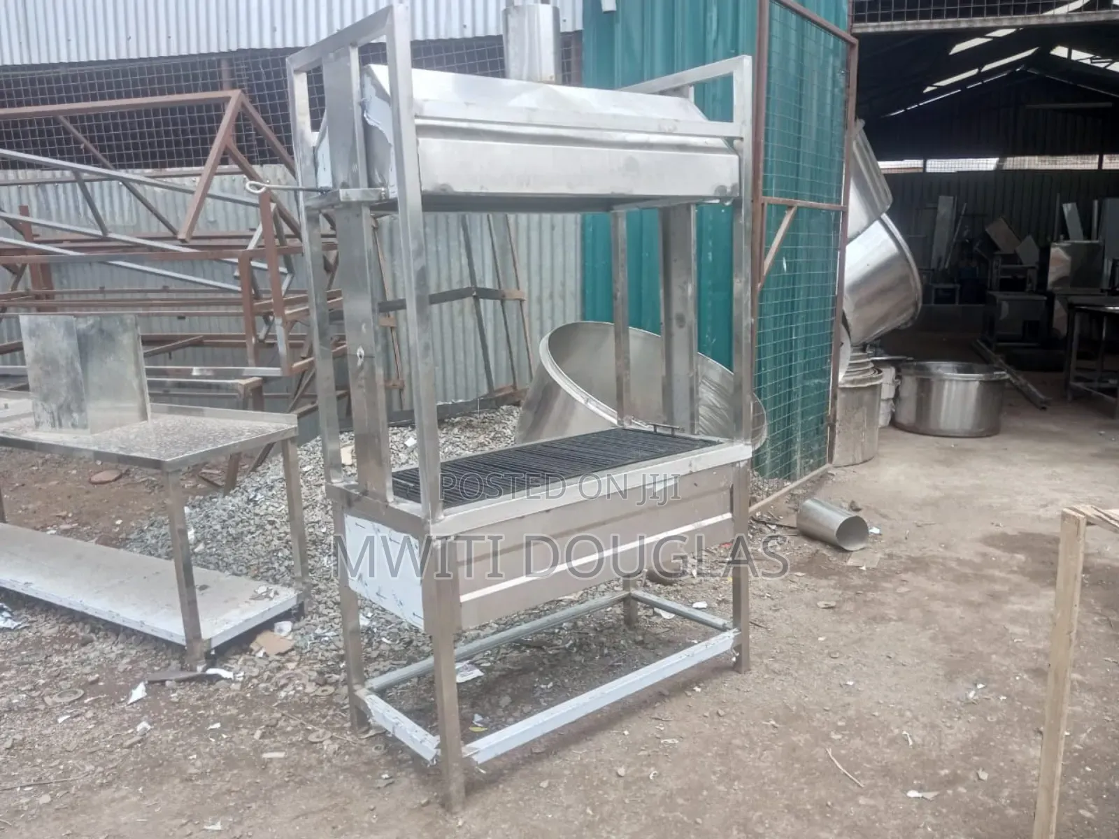 Unique Stainless Grill With a Hood