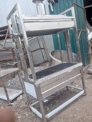 Stainless Grill With an Extended Hood