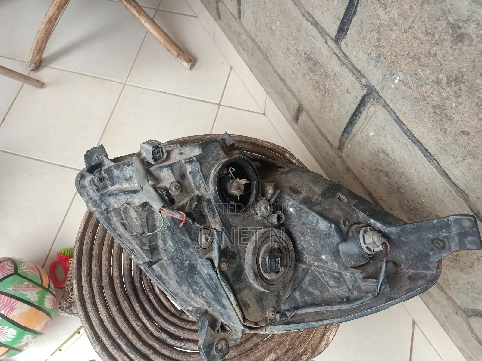 Mazda Verisa Headlight