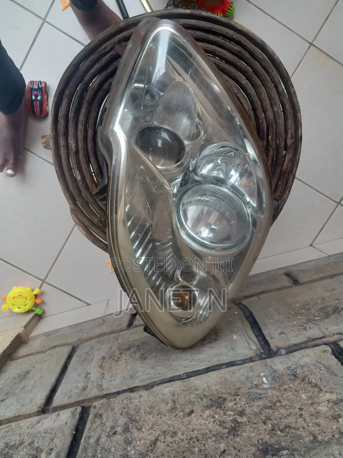 Mazda Verisa Headlight