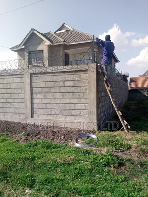 Electric Fence and Razor Installation