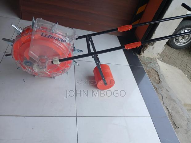 Hand Push Seed Planter . - main view