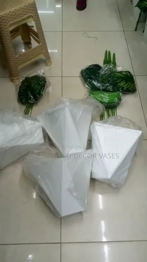 White Hexagon Vases Available in Plenty