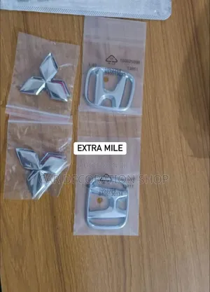 Chrome Mitsubishi or Honda Body Logos