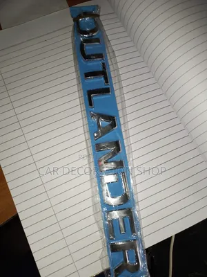 Outlander Silver Lettering Badge