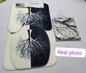 Same Print Set of Bathroom Curtains and Mats.