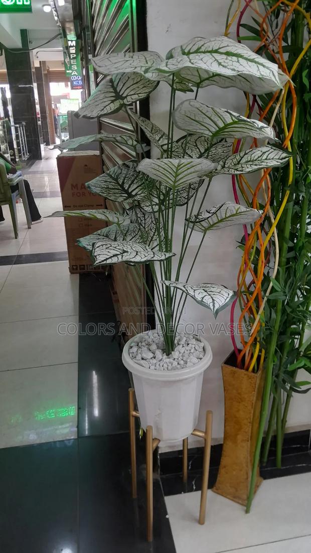 Gold Stand, Vase Plastic and Plant