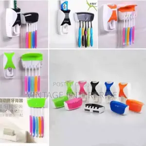 Toothpaste Dispenser/Toothbrush Holder