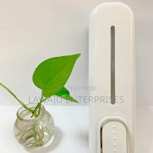 White Wall Mounted Manual Soap Dispenser - thumbnail 2