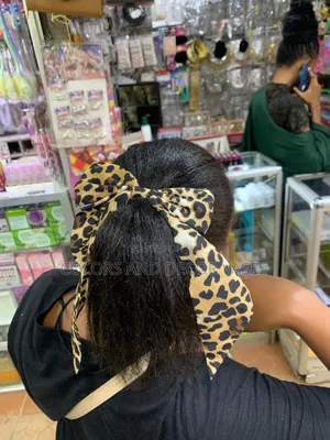 Head Clip Bow in Stock Leopard Print